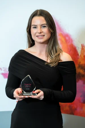 Holly Tuffnell holding her Award [photograph]