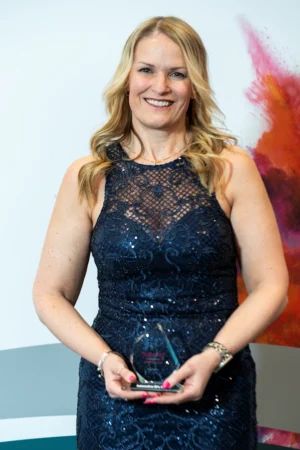 Katie Martin holding her Award [photograph]