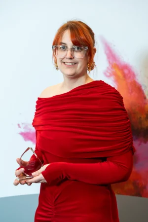Sarah Greaves holding her Award [photograph]